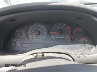 2003 Ford Mustang GT Deluxe z VIN 1FAFP42X43F394679, wystawiony jako IAAI lot #42129223 z przebiegiem 135 472 mil mil oraz . Historia ofert i sprzedaży dostępna na DreamBid. Obrazek 7.