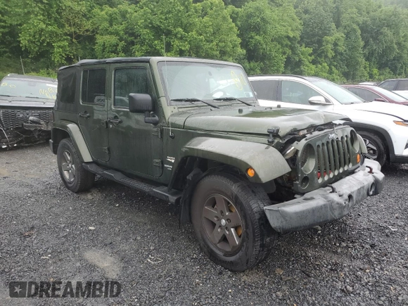 2007 Jeep Wrangler Unlimited Sahara с VIN 1J4GA59107L141710, выставлен на аукционе Copart как лот 59939755 с пробегом 212 659 миль миль и Списание • Salvage title. История ставок и продаж доступна на DreamBid. Изображение 4.