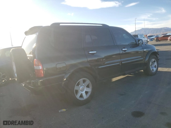 2001 Suzuki XL-7 with VIN JS3TY92V614103969, listed as a Copart auction lot 46933965 with 162,122 mi miles and Salvage Title. Bid and sale history available at carsss.com. Image 3.