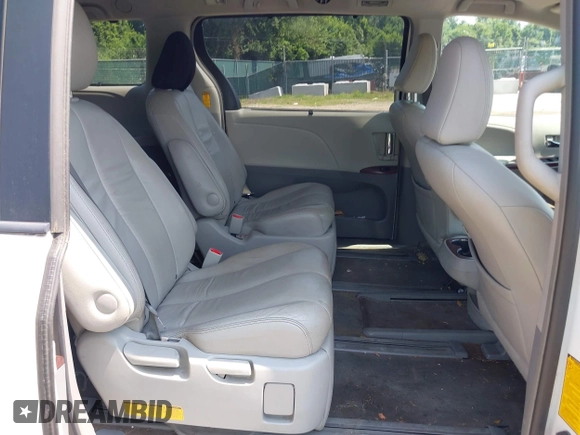 2014 Toyota Sienna Limited with VIN 5TDDK3DC3ES079590, listed as a IAAI auction lot 42694690 with 189,456 mi miles and . Bid and sale history available at DreamBid. Image 8.