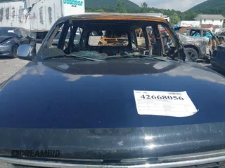 2002 Chevrolet Suburban LT z VIN 1GNFK16Z82J207479, wystawiony jako IAAI lot #42668056 z przebiegiem 140 000 mil mil oraz . Historia ofert i sprzedaży dostępna na DreamBid. Obrazek 10.