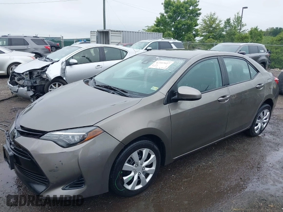 2018 Toyota Corolla L with VIN 2T1BURHE9JC990834, listed as a IAAI auction lot 42583027 with 217,143 mi miles and . Bid and sale history available at DreamBid. Image 2.