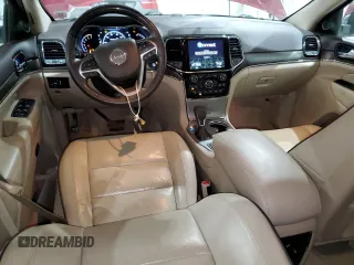 2019 Jeep Grand Cherokee Overland with VIN 1C4RJFCT3KC687246, listed as a Copart auction lot 52098394 with 74,113 mi miles and Salvage Title. Bid and sale history available at carsss.com. Image 8.