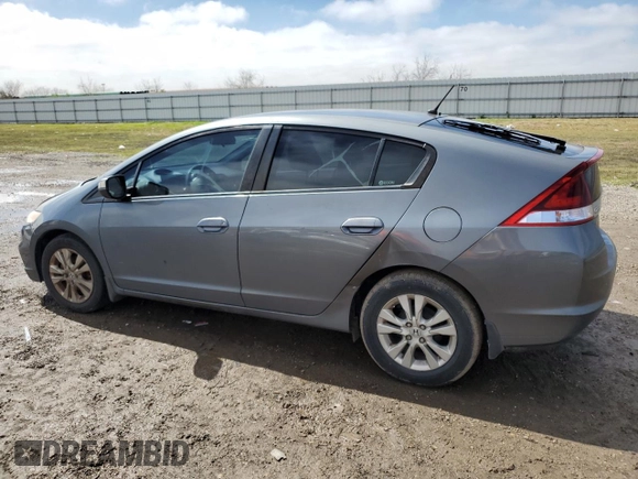 2012 Honda Insight EX z VIN JHMZE2H76CS002087, wystawiony jako Copart lot #46534815 z przebiegiem 165 422 mil mil oraz Czysty tytuł • Clean title. Historia ofert i sprzedaży dostępna na DreamBid. Obrazek 2.