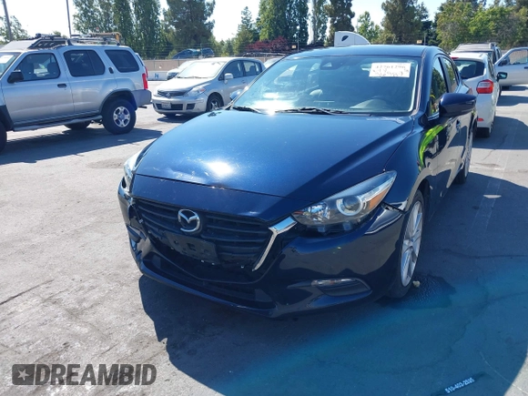2017 Mazda 3 Touring with VIN 3MZBN1L77HM140562, listed as a IAAI auction lot 42761296 with 76,987 mi miles and . Bid and sale history available at DreamBid. Image 6.