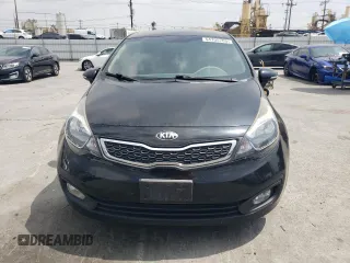 2014 Kia Rio EX z VIN KNADN4A3XE6377570, wystawiony jako Copart lot #54705705 z przebiegiem 63 982 mil mil oraz Tytuł czysty. Historia ofert i sprzedaży dostępna na DreamBid. Obrazek 5.