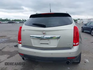 2014 Cadillac SRX Performance Collection z VIN 3GYFNCE35ES610504, wystawiony jako IAAI lot #42133548 z przebiegiem 140 306 mil mil oraz . Historia ofert i sprzedaży dostępna na DreamBid. Obrazek 16.