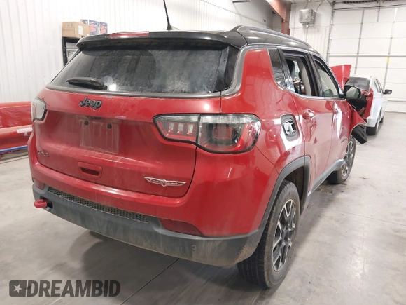 2021 Jeep Compass Trailhawk z VIN 3C4NJDDBXMT586981, wystawiony jako IAAI lot #42116028 z przebiegiem 70 317 mil mil oraz . Historia ofert i sprzedaży dostępna na DreamBid. Obrazek 4.