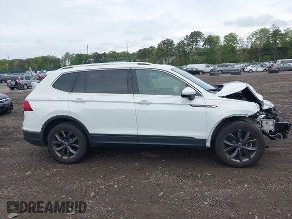 2022 Volkswagen Tiguan SE z VIN 3VV2B7AX8NM109450, wystawiony jako IAAI lot #42248707 z przebiegiem 18 603 mil mil oraz . Historia ofert i sprzedaży dostępna na DreamBid. Obrazek 13.