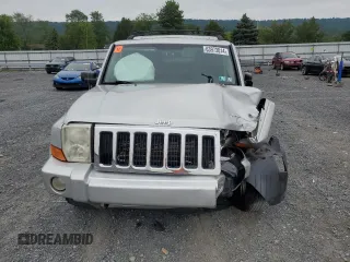 2008 Jeep Commander Sport with VIN 1J8HG48K98C149652, listed as a Copart auction lot 63973014 with 213,947 mi miles and Salvage Title. Bid and sale history available at carsss.com. Image 5.