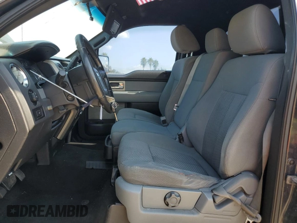 2011 Ford F-150 XL with VIN 1FTMF1EF7BFA72817, listed as a Copart auction lot 75552694 with 185,146 mi miles and Salvage title. Bid and sale history available at DreamBid. Image 7.