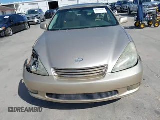 2003 Lexus ES 300 with VIN JTHBF30G730144122, listed as a IAAI auction lot 41738397 with 264,443 mi miles and . Bid and sale history available at carsss.com. Image 12.