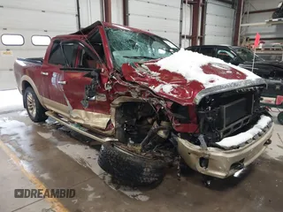 2014 Ram 1500 Longhorn with VIN 1C6RR7PM3ES355763, listed as a IAAI auction lot 41004447 with Not provided miles and . Bid and sale history available at DreamBid. Image 1.