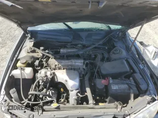 2001 Toyota Camry CE z VIN JT2BG22K410568101, wystawiony jako Copart lot #57184125 z przebiegiem Nie podano mil oraz Szkoda całkowita • Salvage title. Historia ofert i sprzedaży dostępna na DreamBid. Obrazek 11.