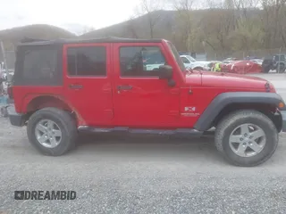 2008 Jeep Wrangler Unlimited X with VIN 1J8GA39128L562347, listed as a IAAI auction lot 41912669 with 106,040 mi miles and . Bid and sale history available at carsss.com. Image 14.