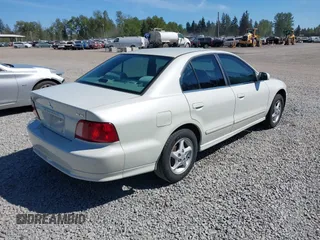 2003 Mitsubishi Galant ES z VIN 4A3AA46G63E162393, wystawiony jako IAAI lot #42184544 z przebiegiem 137 780 mil mil oraz . Historia ofert i sprzedaży dostępna na DreamBid. Obrazek 4.