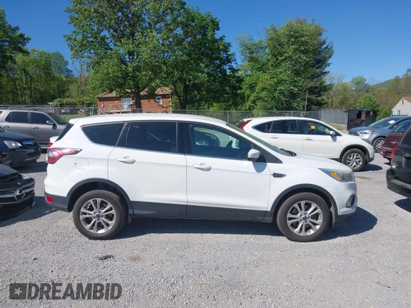 2017 Ford Escape SE with VIN 1FMCU9GD3HUA40233, listed as a IAAI auction lot 42126271 with 284,937 mi miles. Bid and sale history available at carsss.com. Image 14.