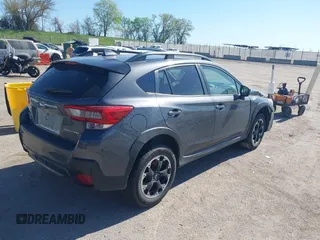 2021 Subaru Crosstrek Premium z VIN JF2GTAEC4M8279380, wystawiony jako IAAI lot #42181035 z przebiegiem 86 982 mil mil oraz . Historia ofert i sprzedaży dostępna na DreamBid. Obrazek 4.