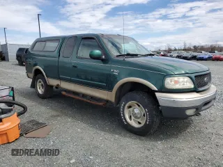2000 Ford F-150 XL with VIN 1FTRX18L5YNB03646, listed as a Copart auction lot 51896585 with 224,065 mi miles and Clean Title. Bid and sale history available at carsss.com. Image 4.