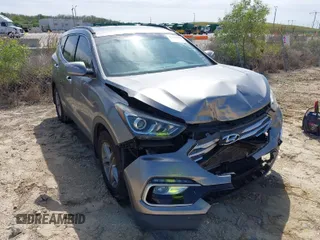 2018 Hyundai Santa Fe Sport 2.4L with VIN 5XYZU3LB8JG563903, listed as a IAAI auction lot 41814986 with 56,287 mi miles. Bid and sale history available at carsss.com. Image 1.