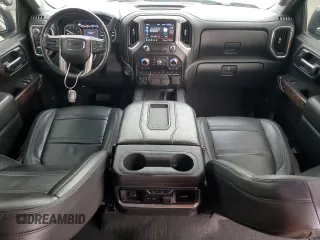 2020 GMC Sierra 1500 Denali z VIN 3GTU9FET7LG441170, wystawiony jako Copart lot #77635974 z przebiegiem 65 028 mil mil oraz Czysty tytuł • Clean title. Historia ofert i sprzedaży dostępna na DreamBid. Obrazek 8.