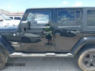 2007 Jeep Wrangler Unlimited Sahara with VIN 1J4GA59187L187656, listed as a IAAI auction lot 42554114 with 200,840 mi miles and . Bid and sale history available at DreamBid. Image 14.