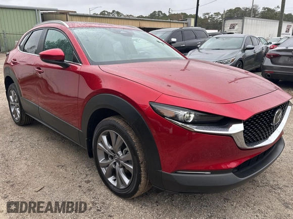 2024 Mazda CX-30 S Preferred z VIN 3MVDMBCM0RM614880, wystawiony jako Copart lot #86984534 z przebiegiem 1 967 mil mil oraz Czysty tytuł • Clean title. Historia ofert i sprzedaży dostępna na DreamBid. Obrazek 1.