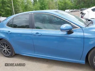 2023 Toyota Camry SE z VIN 4T1T11AK0PU115695, wystawiony jako IAAI lot #42221720 z przebiegiem 67 575 mil mil oraz . Historia ofert i sprzedaży dostępna na DreamBid. Obrazek 13.