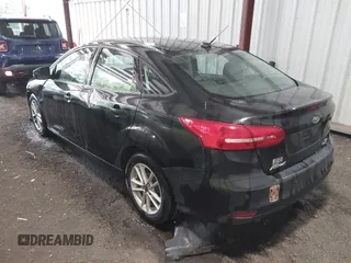 2015 Ford Focus SE with VIN 1FADP3F25FL216205, listed as a IAAI auction lot 42425478 with 124,117 mi miles and . Bid and sale history available at DreamBid. Image 3.