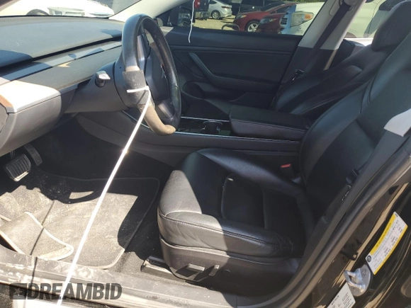 2019 Tesla Model 3 Mid Range z VIN 5YJ3E1EA7KF484369, wystawiony jako Copart lot #51605785 z przebiegiem 101 452 mil mil oraz Nie do naprawy • Non repairable. Historia ofert i sprzedaży dostępna na DreamBid. Obrazek 7.