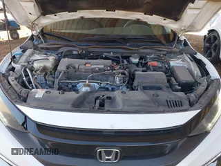 2020 Honda Civic LX with VIN 19XFC2F66LE007328, listed as a IAAI auction lot 41852111 with 135,956 mi miles and . Bid and sale history available at DreamBid. Image 10.