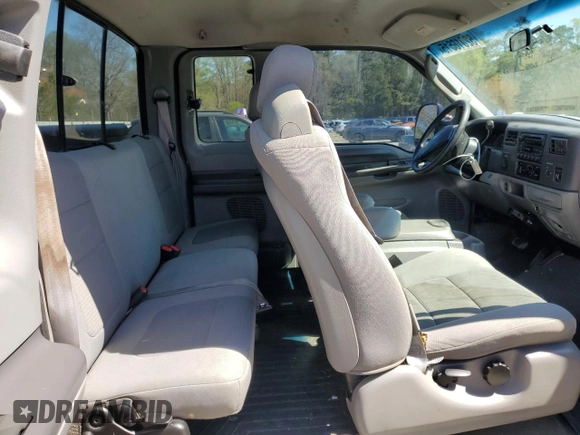 2004 Ford F-250 XL with VIN 1FTNX21P54EC66020, listed as a Copart auction lot 52016515 with 337,412 mi miles and Salvage title. Bid and sale history available at DreamBid. Image 10.