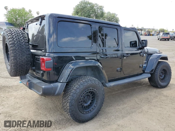 2024 Jeep Wrangler Sahara with VIN 1C4RJXP60RW116607, listed as a Copart auction lot 54562695 with 62,352 mi miles and Salvage title. Bid and sale history available at DreamBid. Image 3.