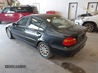 2004 BMW 3 Series 325i with VIN WBAEV334X4KL63050, listed as a IAAI auction lot 42117698 with 173,687 mi miles. Bid and sale history available at carsss.com. Image 3.