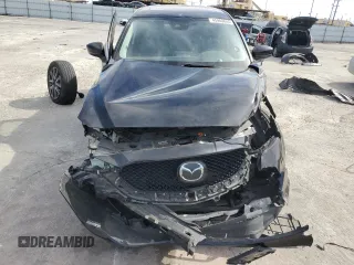 2018 Mazda CX-5 Touring z VIN JM3KFBCM4J0444167, wystawiony jako Copart lot #45900645 z przebiegiem 85 881 mil mil oraz Czysty tytuł • Clean title. Historia ofert i sprzedaży dostępna na DreamBid. Obrazek 5.