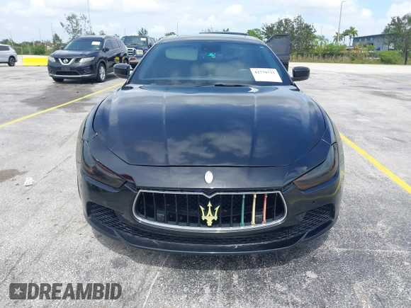 2015 Maserati Ghibli with VIN ZAM57XSA1F1144073, listed as a IAAI auction lot 42770723 with 105,782 mi miles and . Bid and sale history available at DreamBid. Image 12.