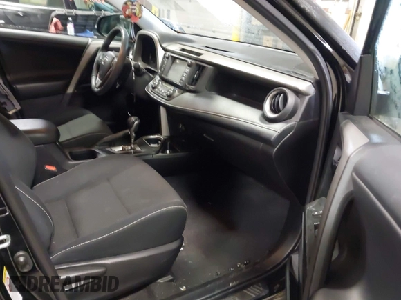 2018 Toyota RAV4 XLE with VIN 2T3RFREV0JW715761, listed as a IAAI auction lot 41881863 with 67,534 mi miles and . Bid and sale history available at DreamBid. Image 5.
