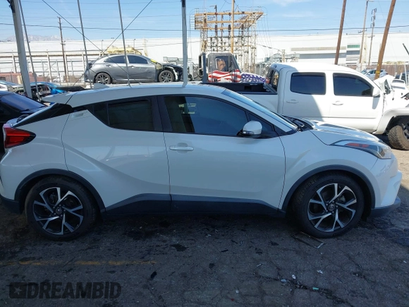 2018 Toyota C-HR XLE with VIN NMTKHMBX9JR022921, listed as a IAAI auction lot 41858651 with 50,448 mi miles. Bid and sale history available at carsss.com. Image 12.