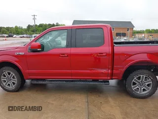 2015 Ford F-150 XLT with VIN 1FTEW1EF4FFD01545, listed as a IAAI auction lot 42355249 with 166,958 mi miles and . Bid and sale history available at DreamBid. Image 14.