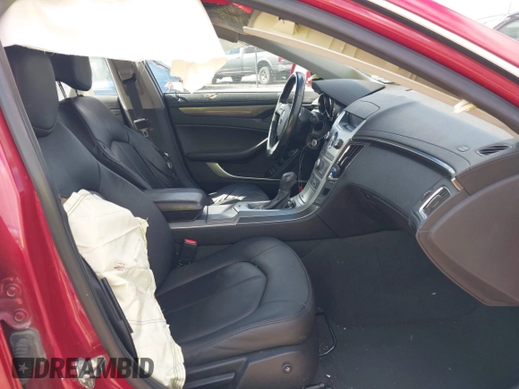 2011 Cadillac CTS with VIN 1G6DC5EY2B0143073, listed as a IAAI auction lot 42322497 with 133,992 mi miles and . Bid and sale history available at DreamBid. Image 5.