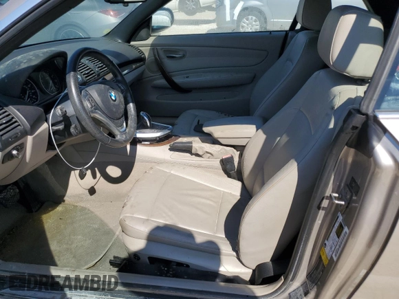 2013 BMW 1 Series 135i with VIN WBAUN7C52DVM26880, listed as a Copart auction lot 77858684 with 0 mi miles and Salvage Title. Bid and sale history available at carsss.com. Image 7.