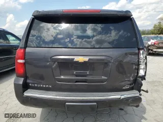 2015 Chevrolet Suburban LTZ with VIN 1GNSCKKCXFR216890, listed as a Copart auction lot 52695155 with 233,296 mi miles and Clean Title. Bid and sale history available at carsss.com. Image 6.