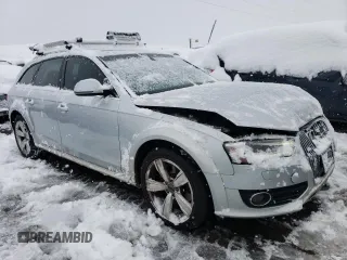 2014 Audi allroad Premium Plus with VIN WA1UFAFL4EA111251, listed as a Copart auction lot 79521734 with 136,971 mi miles and Salvage Title. Bid and sale history available at carsss.com. Image 4.