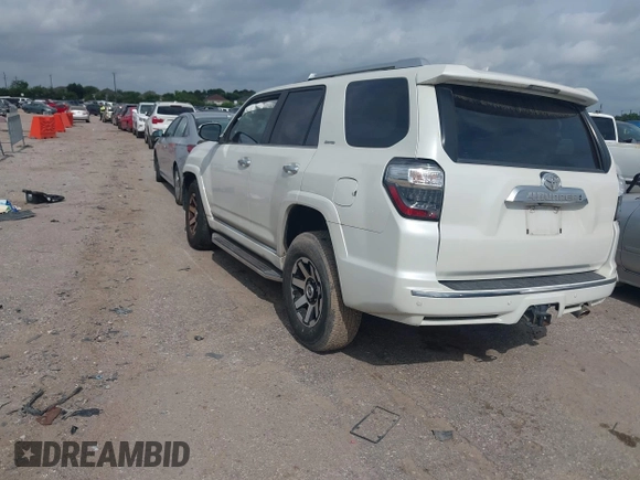 2014 Toyota 4Runner SR5 with VIN JTEZU5JR7E5080554, listed as a IAAI auction lot 42134833 with 170,077 mi miles and . Bid and sale history available at DreamBid. Image 3.
