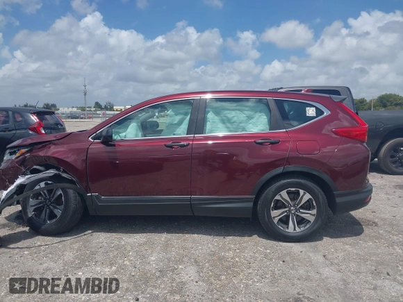 2019 Honda CR-V LX with VIN 2HKRW5H33KH402697, listed as a IAAI auction lot 41942219 with 80,826 mi miles. Bid and sale history available at carsss.com. Image 15.