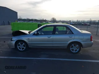 2003 Mazda Protege DX with VIN JM1BJ225X31160766, listed as a IAAI auction lot 41941361 with 190,125 mi miles and . Bid and sale history available at DreamBid. Image 13.