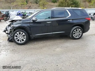 2021 Chevrolet Traverse Premier with VIN 1GNEVKKW2MJ252599, listed as a Copart auction lot 77796994 with 67,001 mi miles and Salvage Title. Bid and sale history available at carsss.com. Image 1.