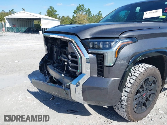 2022 Toyota Tundra 1794 Edition with VIN 5TFMA5DB9NX015571, listed as a IAAI auction lot 41730283 with 76,429 mi miles and . Bid and sale history available at DreamBid. Image 19.