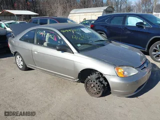 2003 Honda Civic LX with VIN 1HGEM22583L030981, listed as a IAAI auction lot 40997002 with 174,652 mi miles. Bid and sale history available at carsss.com. Image 1.