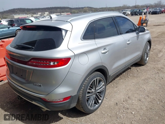 2015 Lincoln MKC with VIN 5LMTJ2AH8FUJ23341, listed as a IAAI auction lot 41828159 with 103,562 mi miles. Bid and sale history available at carsss.com. Image 4.